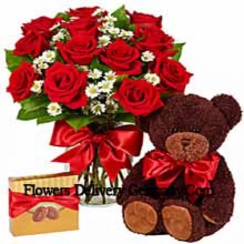 11 Red Roses With Some Ferns In A Glass Vase, A Cute 14 Inches Tall Teddy Bear And An Imported Box Of Chocolates