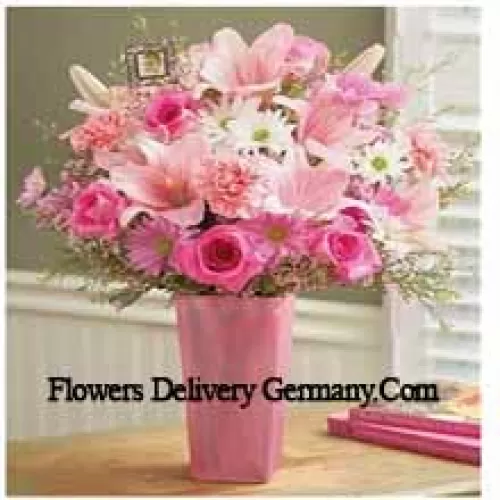 Pink Roses, Pink Carnations, Pink Gerberas, White Gerberas And Pink Lilies With Seasonal Fillers In A Glass Vase