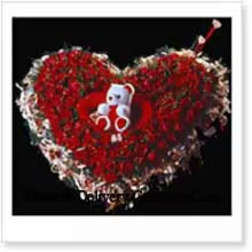 Heart Shaped Arrangement Of 101 Red Roses and a Teddy Bear