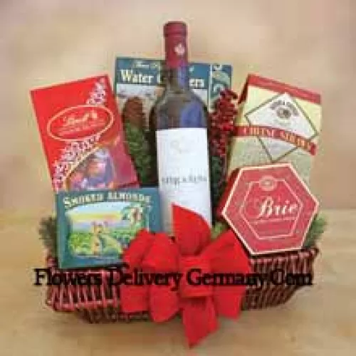 This beautiful Gift basket includes a bottle of California cabernet sauvignon, savory smoked almonds, cheese, water crackers, crisp cheese straws and Lindt chocolate truffles. (Contents of basket including wine may vary by season and delivery location. In case of unavailability of a certain product we will substitute the same with a product of equal or higher value)